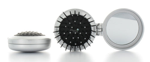 Brosse pliante avec miroir